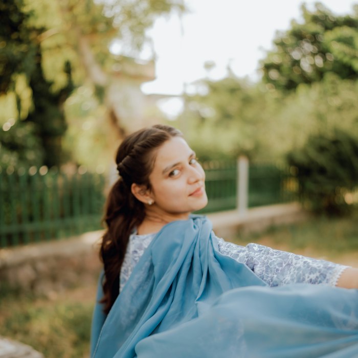 A powder blue chanderi suit set photographed outdoors