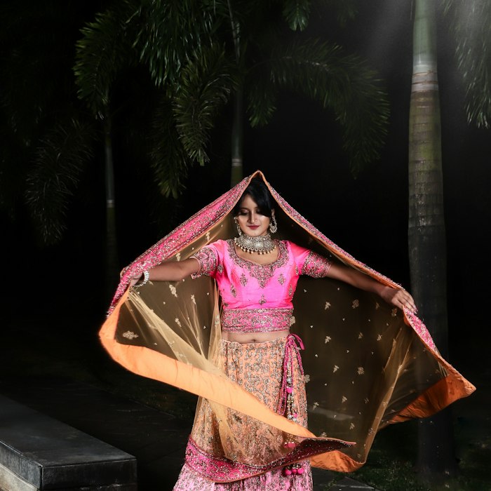 A festive dupatta held up against the light